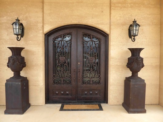 double arched door in rammed earth w