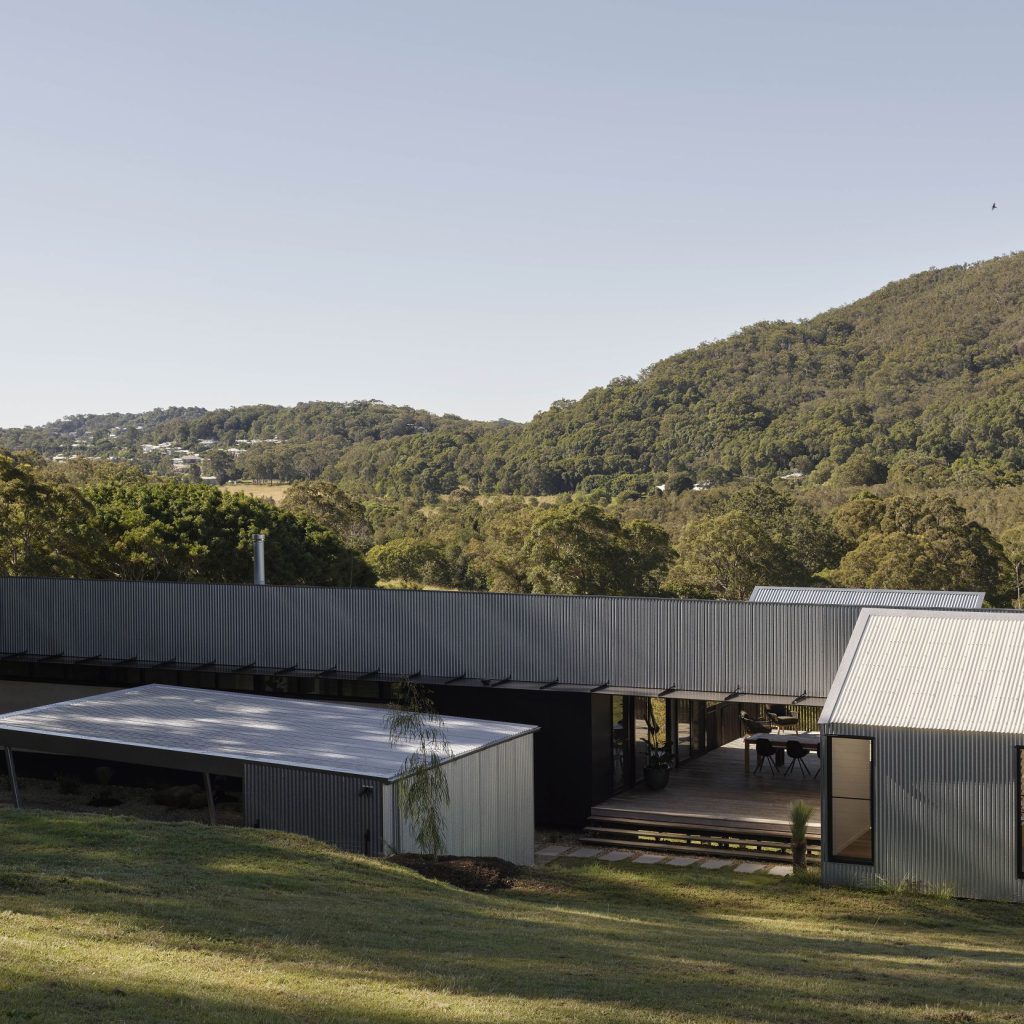 Rammed earth and corrugated steel home