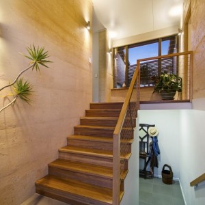 Rammed earth staircase, two storey home
