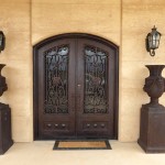 arched doors in rammed earth walls