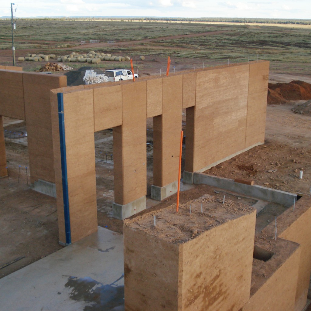 rammed earth walls under construction, outback queensland